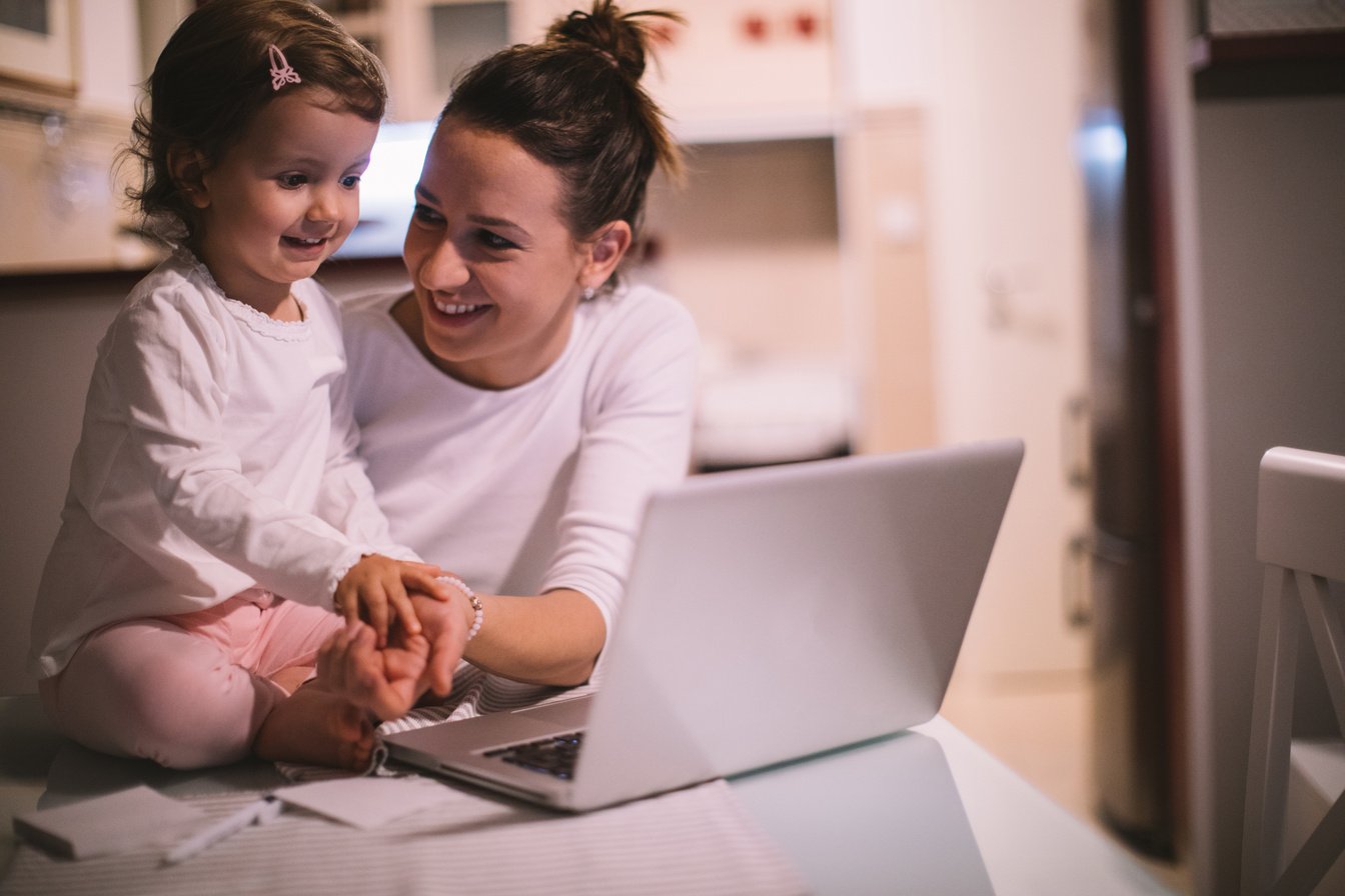 Playing on a computer with my mom